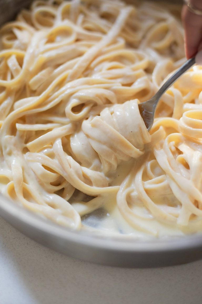 Fettuccine alfredo in a skillet.